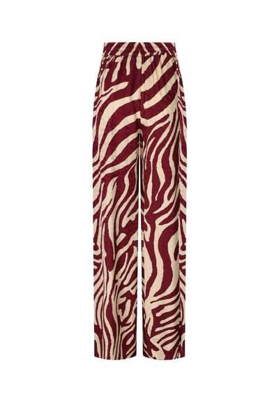 Pantalones de pierna ancha en un patrón de cebra burdeos y crema, confeccionados con una tela suave, con cinturilla elástica y bolsillos laterales.