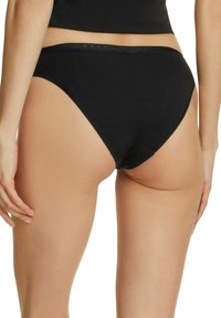 FALKE DAILY CLIMATE CONTROL OUTLAST® - Slip - black