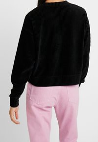 Monki Felpa - black