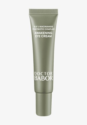 Zielonkawy tuba kremu do oczu o matowym wykończeniu, oznaczona napisem "Doctor Babor Awakening Eye Cream" w białym kolorze. Zawiera niacynamid.