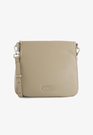 Beige leather crossbody bag with textured surface, adjustable strap, and metal hardware. Features a small logo patch on the front.