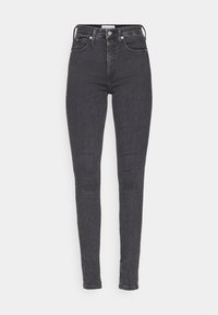 Högmidjade skinny jeans i mörkgrå denim. Har en framknäppning, femfickorsdesign och subtila silverdetaljer.