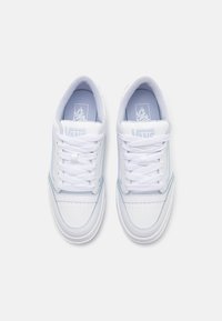 White sneakers with a smooth leather upper, blue accents, and classic lace-up design. Features perforated detailing on the toe box.
