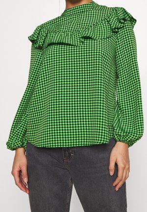 Groen-zwart geruit blouse met gerimpelde halslijn en lange mouwen, voorzien van elastische manchetten en een losse pasvorm. Getextureerde stof.