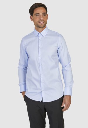 Light blue long-sleeve dress shirt with button-down collar, smooth texture, and front placket featuring matching buttons. Worn with dark trousers.