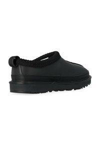 Scarpe slip-on nere con tomaia testurizzata, dotate di collo intrecciato e suola in gomma spessa con motivo antiscivolo per una migliore presa.