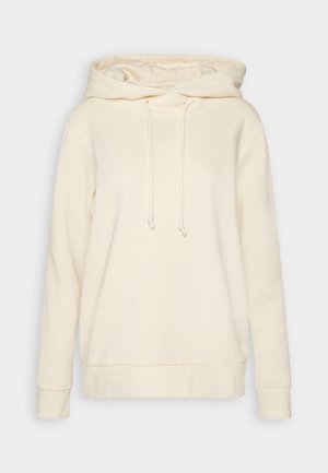 Cream-colored hoodie made of soft fabric. Features a large hood, adjustable drawstrings, and ribbed cuffs and hem. Simple, neutral design.