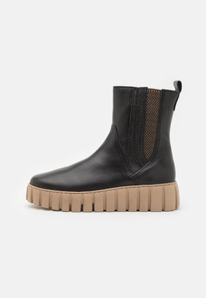 Bottines à plateau - schwarz/beige