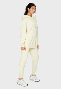 SQUATPROOF SP LEFT COMFY ACTIVE PUMP COVER  - Verryttelyhousut - cream