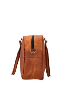 Brown leather shoulder bag with black zipper top, side pockets, and adjustable strap, shown from the side on a white background.