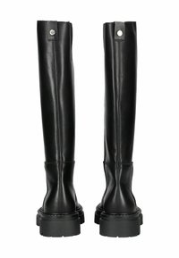 Bottes noires en cuir au-dessus du genou avec une finition lisse, des orteils ronds, des semelles épaises et des accents de boutons-pression en haut.