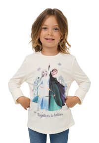 T-shirt a maniche lunghe bianco con una grafica colorata di due personaggi, con la scritta "Insieme è meglio" sottostante e una texture di tessuto morbido.