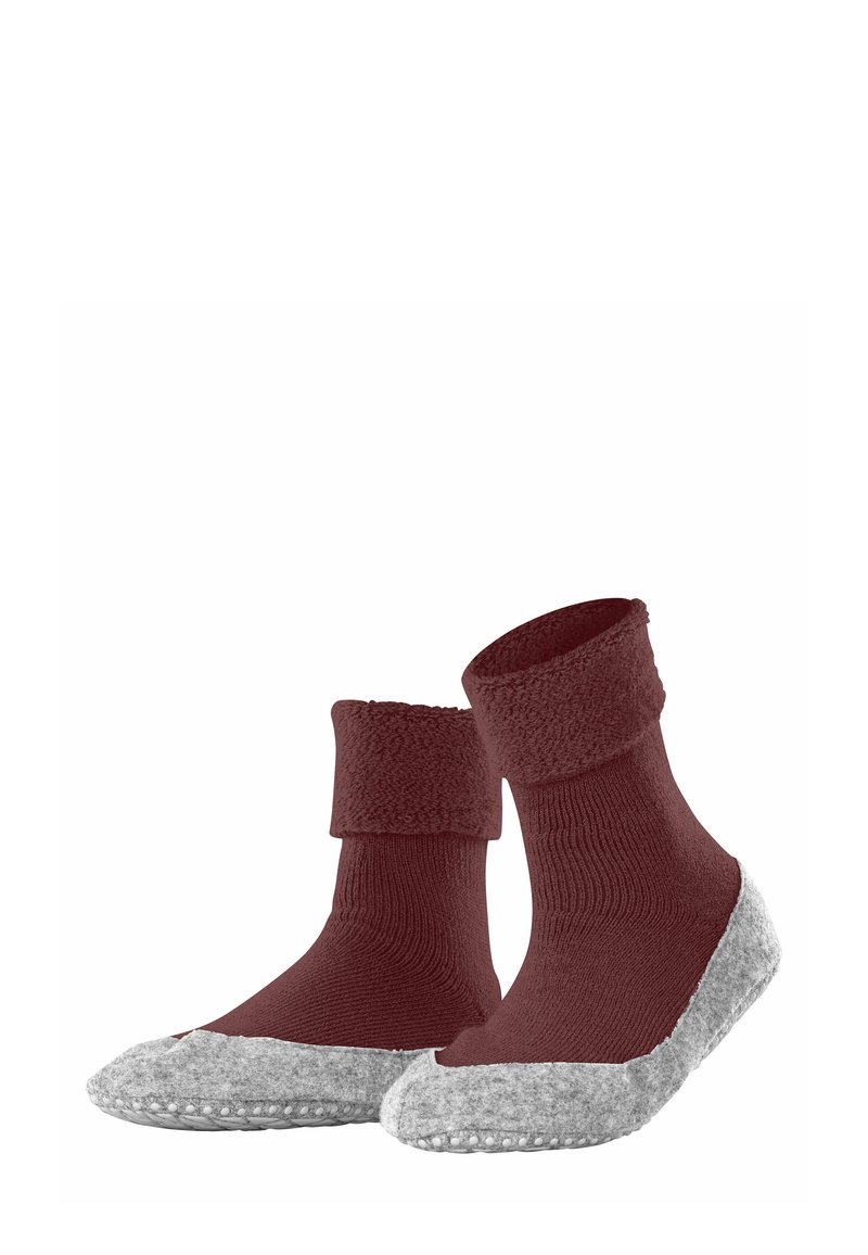 Burgunderrote Socken mit einem weichen, strukturierten Bündchen und grauen, strukturierten Sohlen. Das Design zeichnet sich durch einen engen Sitz aus und besteht aus einer Materialmischung, die Wärme bietet.