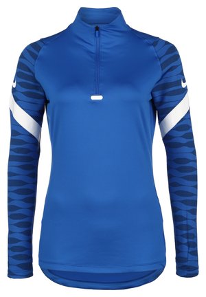 Blauw sporttop met een halve rits, voorzien van lange mouwen met een donkerblauw golvend patroon en een witte accentstreep over de schouders.