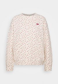 Felpa girocollo di color avorio con piccolo motivo floreale rosa e patch del logo rosso Levi's sul lato sinistro del petto.