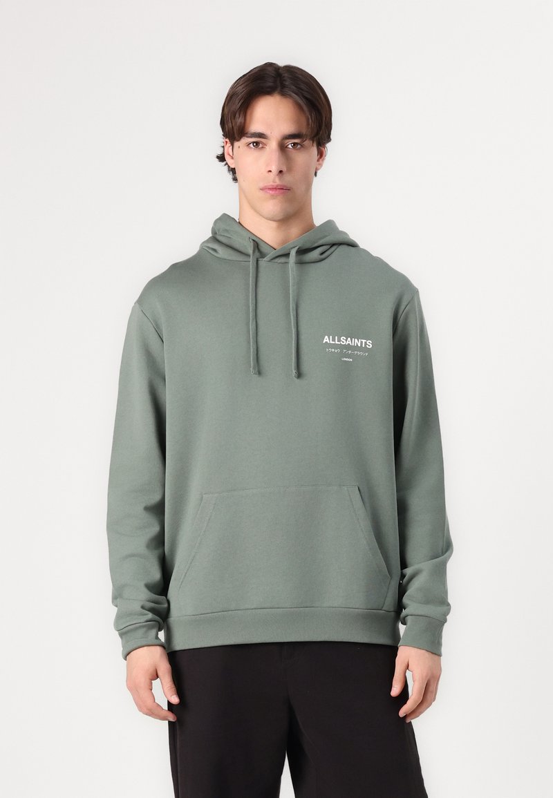 Grey-green hoodie with a front pocket and drawstring hood. Features "ALLSAINTS" logo in white on the left chest. Smooth texture.