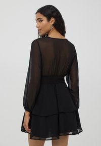 Terranova BALZE PUNTO SMOCK IN VITA - Vestito casual - nero