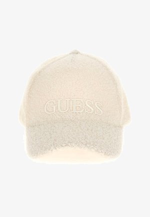 Kremfarvet tekstureret baseballcap med fremhævet "GUESS"-logo broderet på frontpanelet.