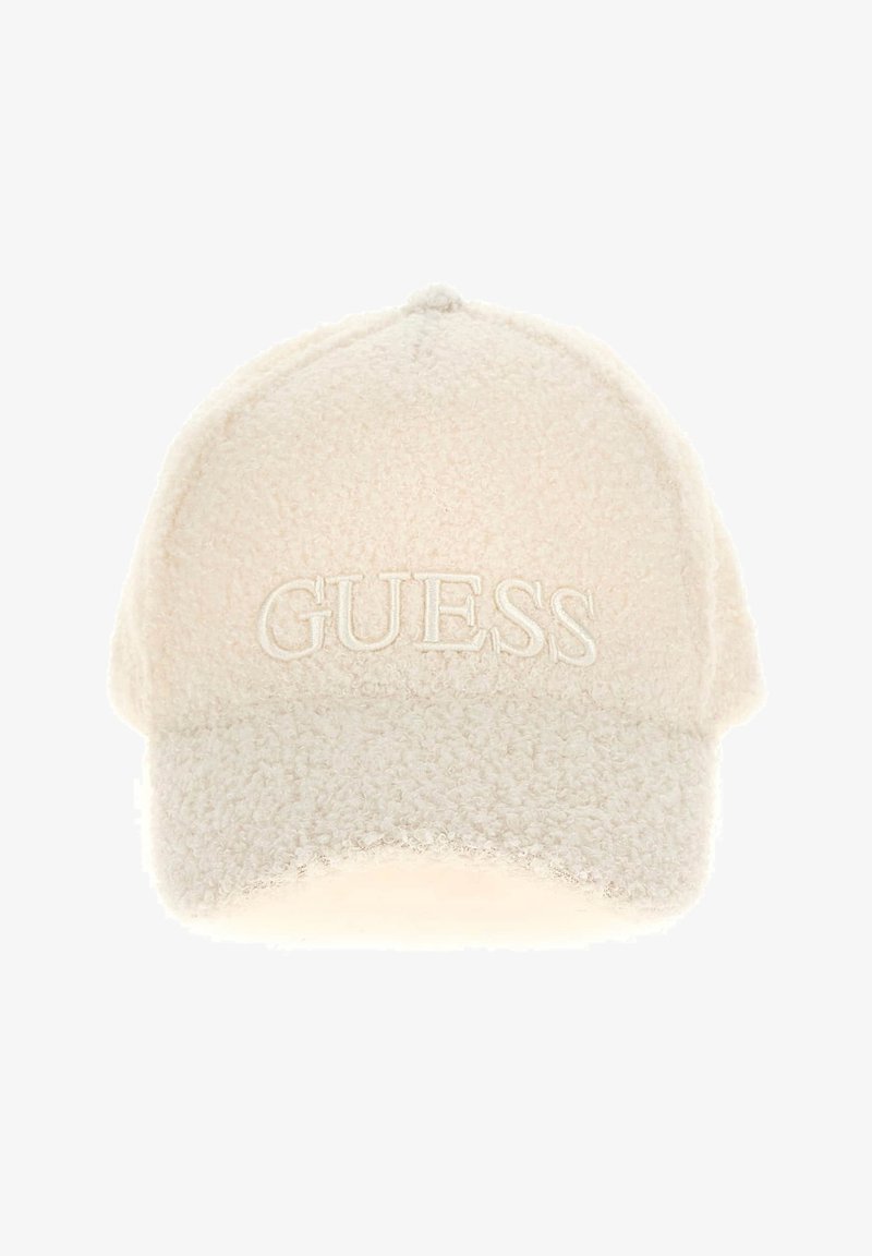 Casquette de baseball texturée couleur crème avec broderie du logo "GUESS" en relief sur le panneau avant.