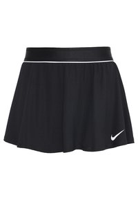 Falda atlética negra con una cinturilla ancha, textura acanalada sutil, ribete blanco cerca de la parte superior y un logo de Nike en blanco en el dobladillo.