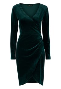 Smaragdgrünes Samtkleid mit langen Ärmeln, V-Ausschnitt und einem Wickeldesign, das einen seitlichen Drapierungseffekt für Textur und Form bietet.