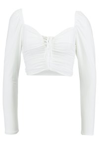 White cropped top featuring long sleeves, a sweetheart neckline, textured fabric with ruching, and a center lace-up detail.