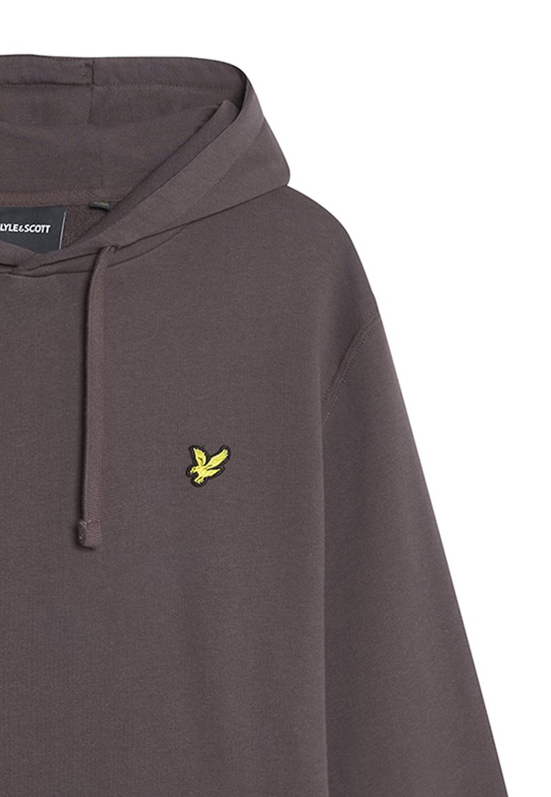 Felpa grigia con cappuccio, caratterizzata da un logo di un uccello giallo sul petto. Tessuto morbido, vestibilità rilassata e cordino sul cappuccio.