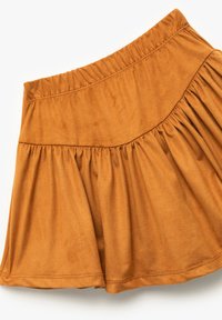 Brun, texturerad kjol gjord av mjukt tyg, med ett elastiskt midjeband och en samlad design för en utsvängd silhuett vid nederkanten.