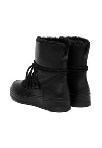 Czarne botki za kostkę z gładkiej skórzanej powierzchni, sztucznym futrem w górnej części oraz czarnymi sznurowadłami, z gumową podeszwą i okrągłym noskiem.