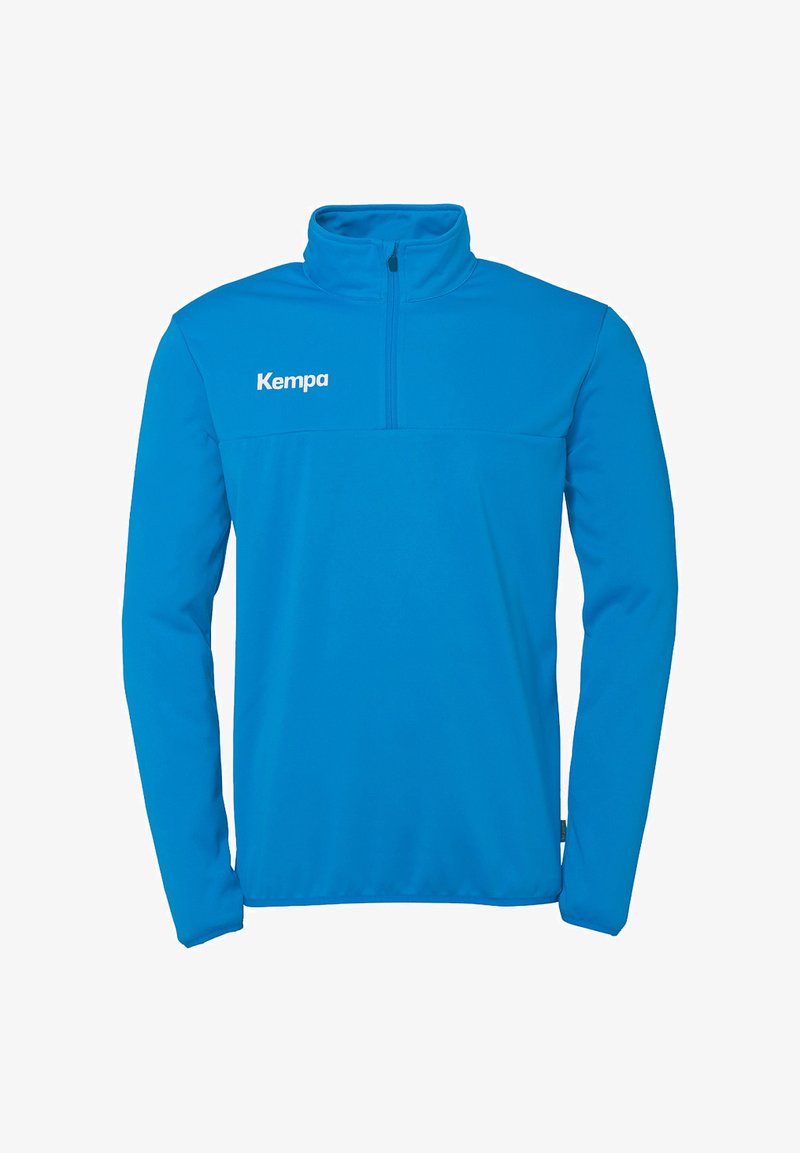 Pull bleu de sport en matériau synthétique lisse, avec un col zippé mi-hauteur et le logo de la marque "Kempa" en haut à gauche.