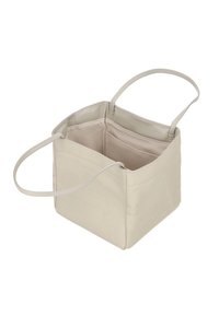 Vierkante tas van gestructureerd crèmekleurig kunstleer met twee lange handvatten. Het interieur is gevoerd met gladde stof en bevat vakken.