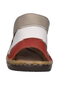 Multicolored slide sandal featuring beige, white, and red leather straps, with a brown textured sole and visible stitching detail.