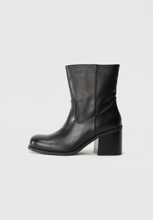 High heeled ankle boots - black