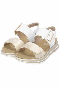 Beige und weiße Sandalen mit strukturierter Oberfläche, verstellbaren Riemen und einer goldenen Schnalle auf einer gepolsterten Sohle mit subtilen weißen Streifen.