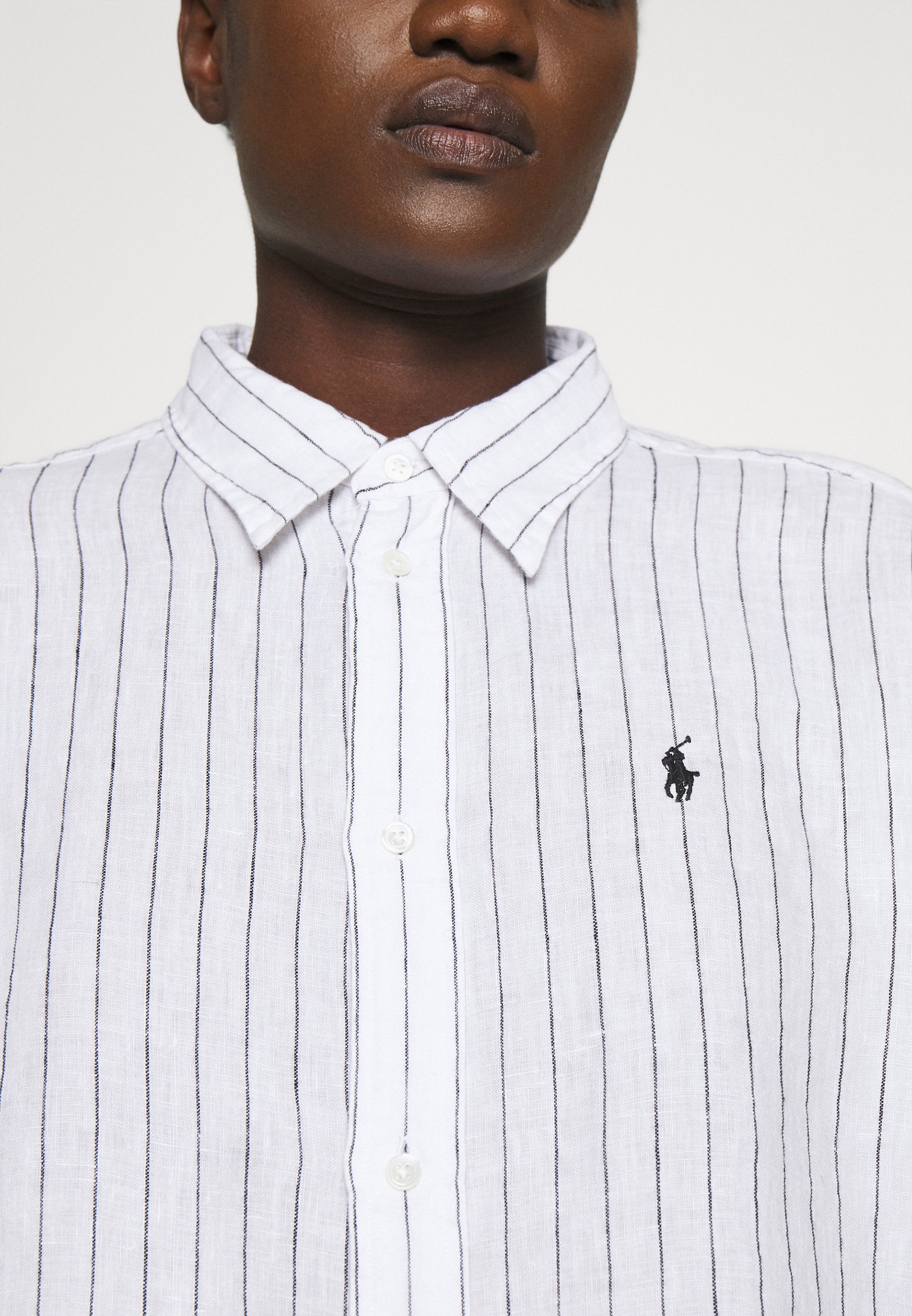 white polo button down