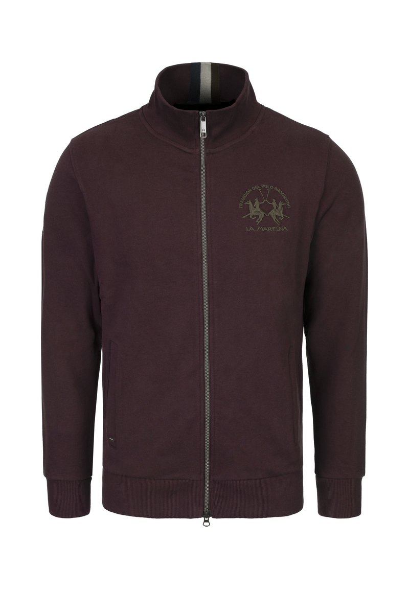 Men's zip-up jacket in deep purple, made of soft fabric. Features a high collar, two front pockets, and an embroidered logo on the chest.