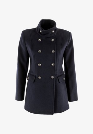 Cappotto in lana blu navy con colletto alto, design doppiopetto, bottoni in tonalità argentata e tasche laterali. Tessuto liscio con vestibilità su misura.