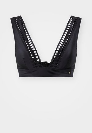 Schwarzer Bralette mit weitem gewelltem Saum, tiefem V-Ausschnitt und nahtlosem Material. Verfügt über einen Rückenverschluss mit minimalem Hardwareeinsatz.