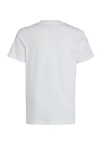 Camiseta de algodón blanca con cuello redondo y mangas cortas. Textura suave con diseño liso, sin patrones ni acentos visibles.
