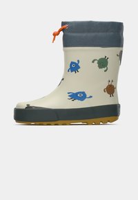 Bottes de pluie beiges pour enfants avec cordon orange, revers gris, semelle noire et illustrations de monstres colorés et ludiques.