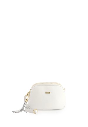 Kleine weiße Umhängetasche mit goldenem Reißverschluss, verstellbarem Riemen, Quasten-Detail und kleinem goldenem Markenlogo auf der Vorderseite.