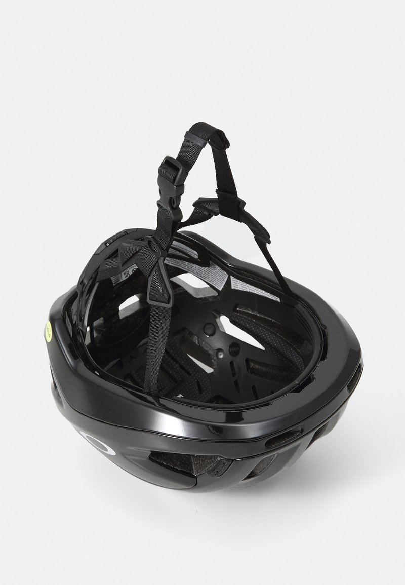 Black cycling helmet with a glossy exterior, adjustable straps, ventilation holes, and a padded interior for comfort and safety.
