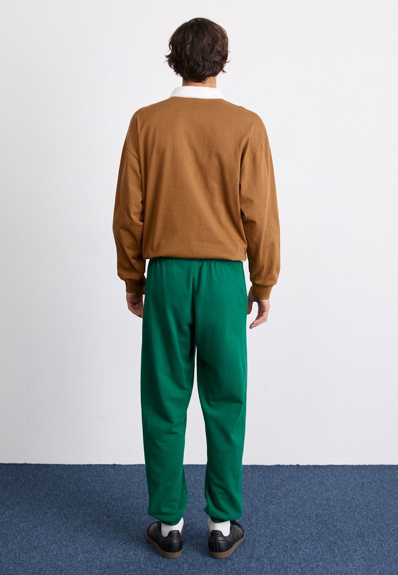 adidas Originals PRE-LOVED - Teplákové kalhoty - collegiate green