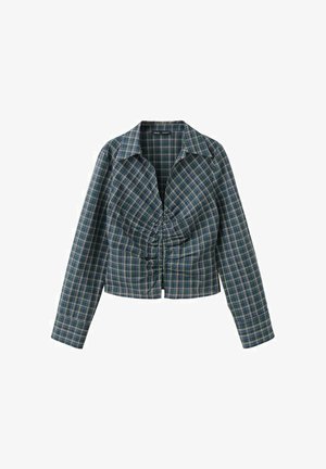 Bluza cu mâneci lungi în carouri verde și albastru închis, cu detaliu adunat în față și guler lat, croială scurtă.