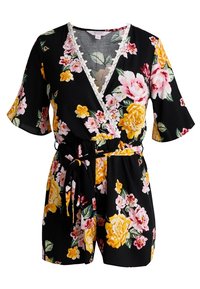 Kukkainen haalari mustana, jossa on vaaleanpunaisia ja keltaisia kukkia. Siinä on v-pääntie, pitsireunus, lyhyet hihat ja solmittava vyö vyötäröllä.