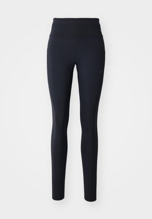 Mustad mustikud, mis on valmistatud venivast kangast, kõrge vöökoha ja lihvitud disainiga, ilma nähtavate mustrite või detailideta.