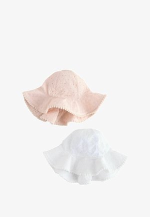 Zwei breitkrempige Baby-Sonnenhüte in Pink und Weiß, mit Lochstickerei und Bommelbesatz an den Rändern.