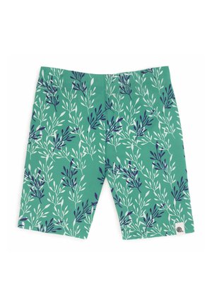 Zielone spodenki do kolan z białym i ciemnoniebieskim wzorem liści gałęzi oraz małą okrągłą metką z logo na dole po prawej stronie nogawki.