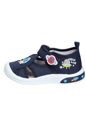 Granatowy sandał dla malucha z białą podeszwą, naszywkami kosmos i dinozaur, ozdobą rakiety na palcu i pięcie oraz regulowanym paskiem na rzep.