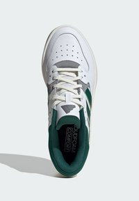 White athletic shoe with green accents, leather and mesh materials, perforated toe box, padded collar, and "Cloudfoam Comfort" insole.